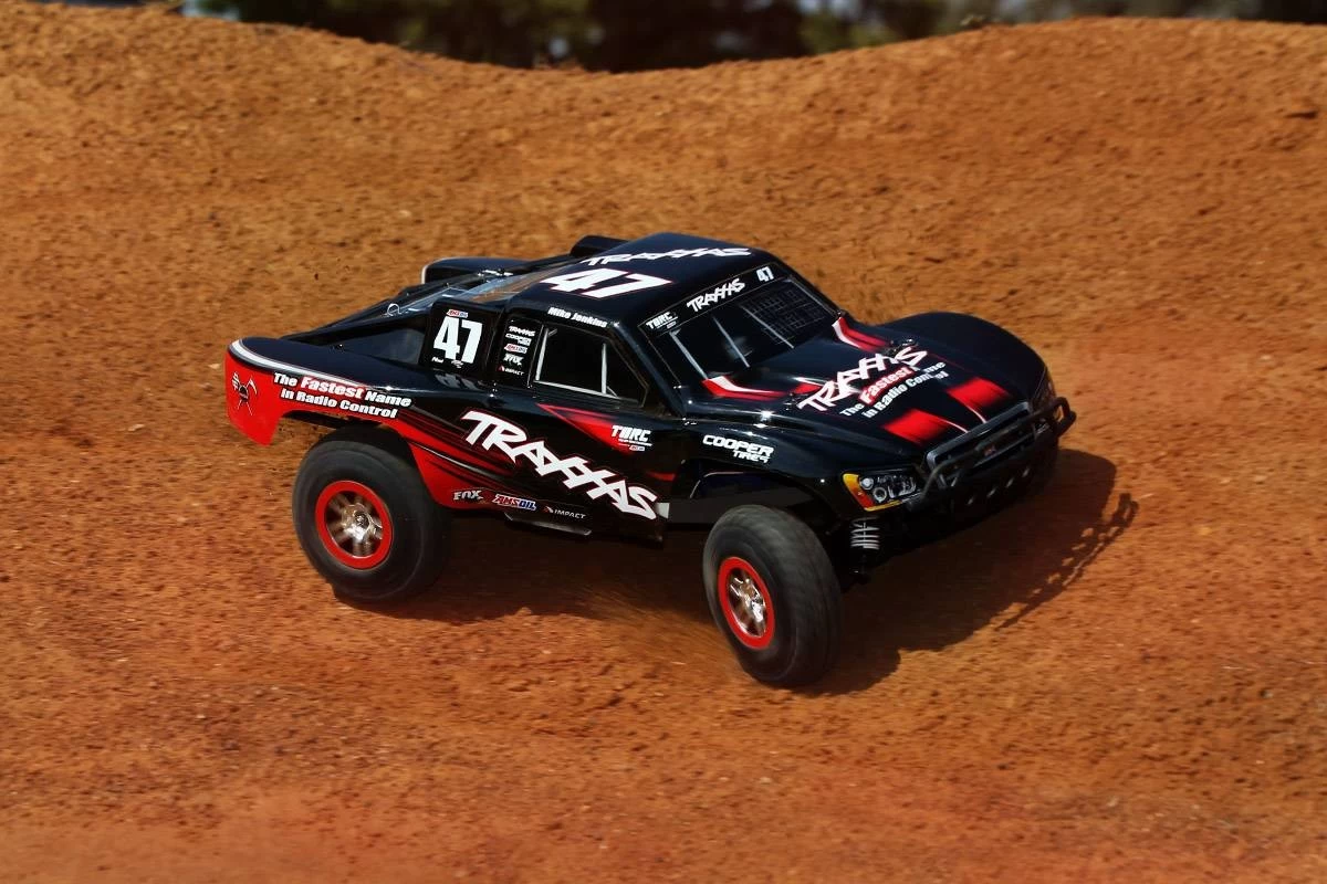 Slash 4X4: 1/10 Scale 4WD Electric Short Course Truck With TQi Traxxas Link Enabled 2.4GHz Radio System & TSM 1 Slash 4X4: 1/10 Scale 4WD Electric Short Course Truck With TQi Traxxas Link Enabled 2.4GHz Radio System & TSM